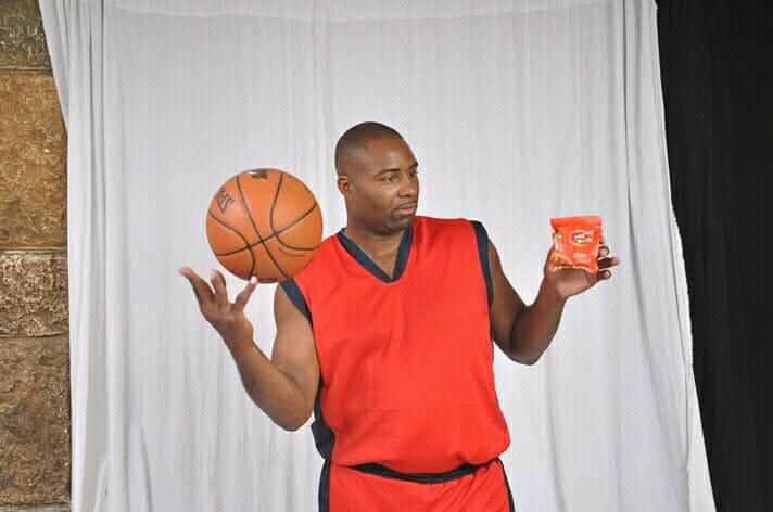 Coach Carlos promoting Mix Max Chips through basketball